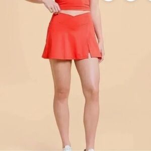 Blogilates Crisscross Slit Skort spicy orange - XS